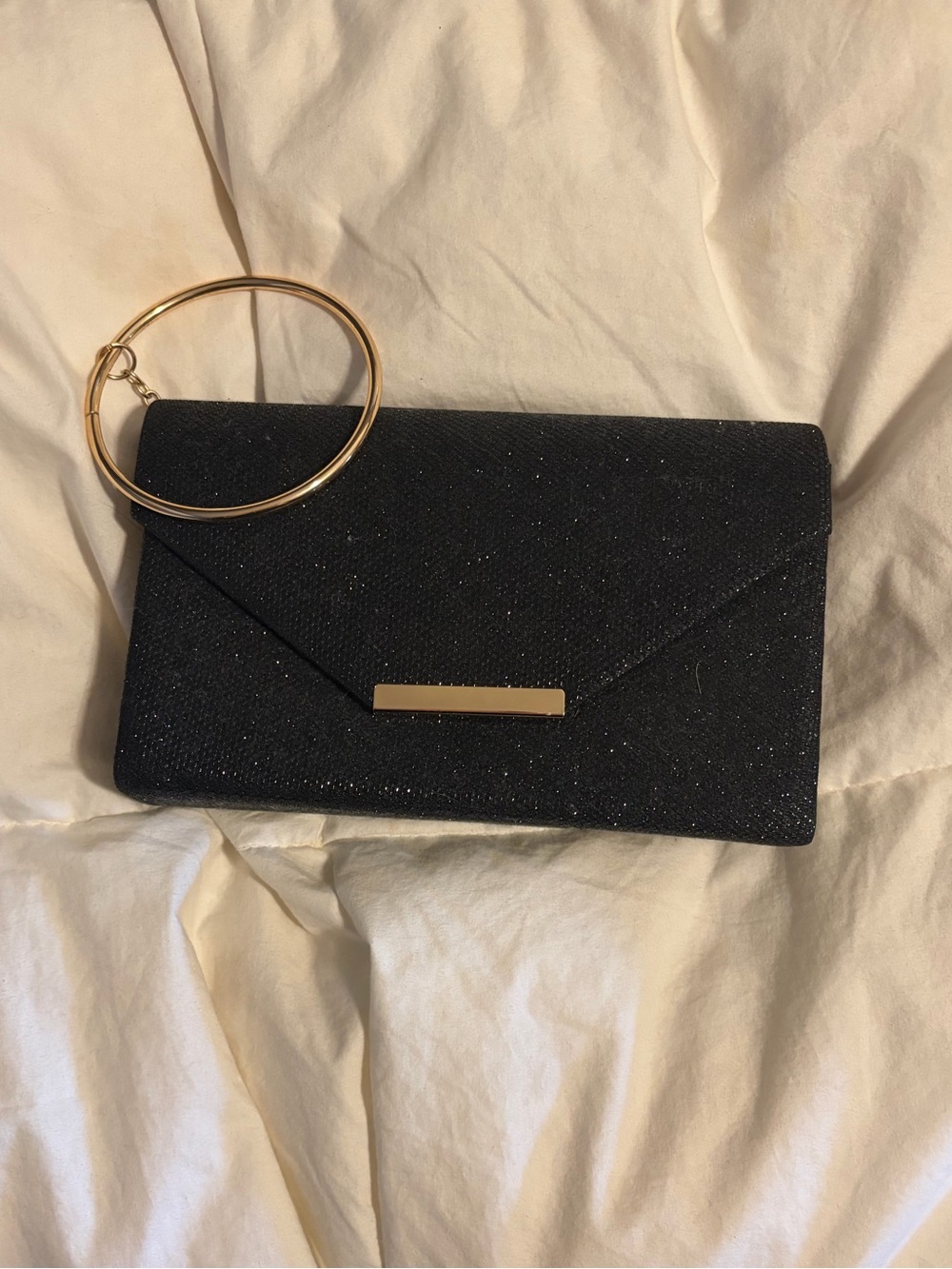 Elegant Black Wristlet Clutch with Gold Ring Accent